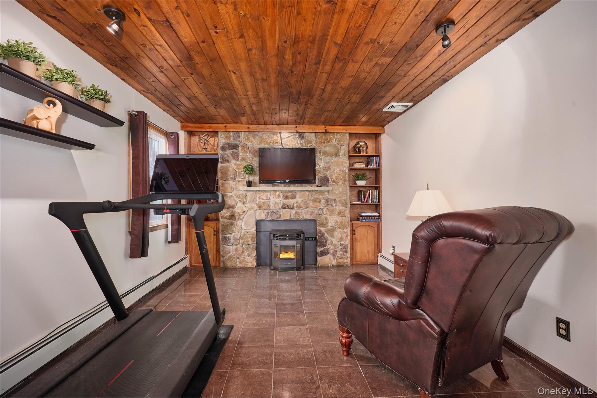 180 Ridge Drive Middletown, NY 10940 - Photo 18 of 43 Quiet and cozy great for an inhome office, exercise room or library with a great pellet stove fireplace insert