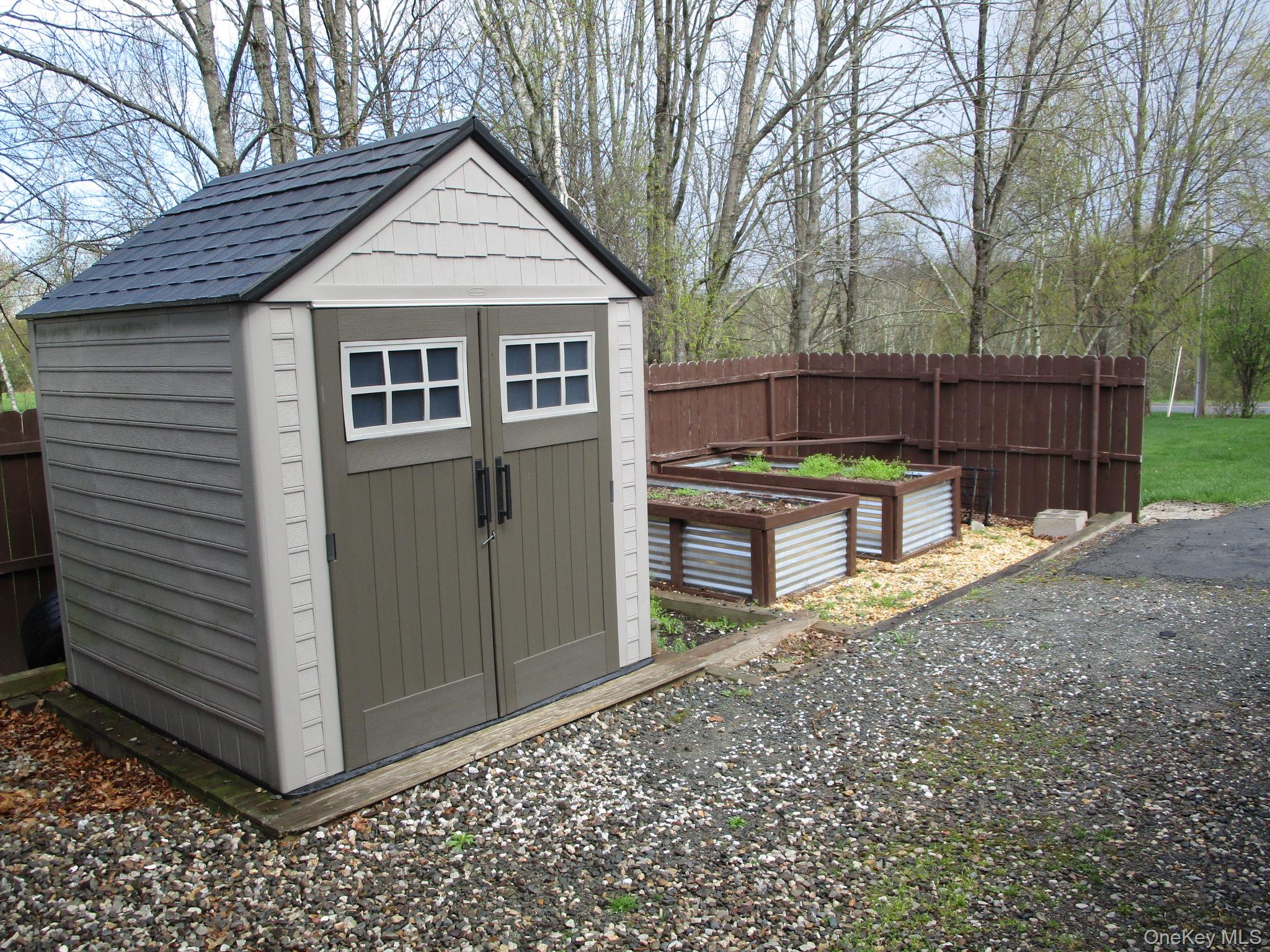 180 Ridge Drive Middletown, NY 10940 - Photo 40 of 43 Tool shed and raised bed gardens