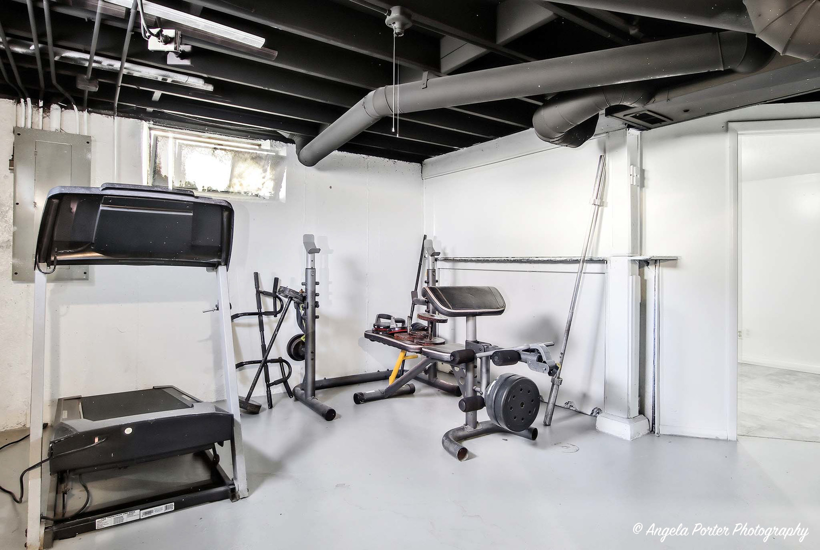 1612 Whitney Street Waukegan, IL 60087 - Photo 14 of 20 a view of a room with gym equipment