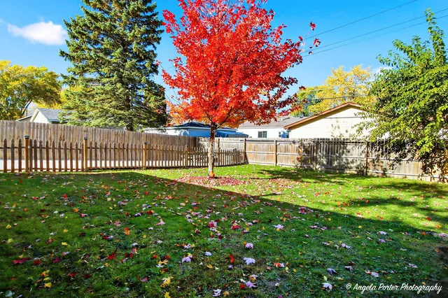 a view of a house with a big yard