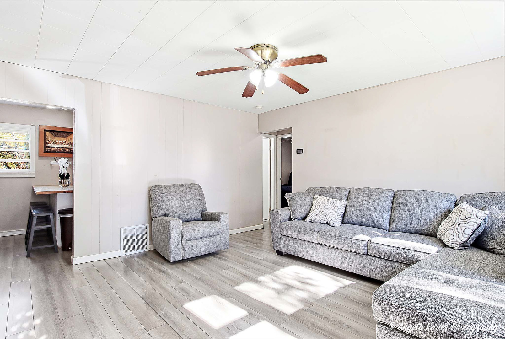 1612 Whitney Street Waukegan, IL 60087 - Photo 5 of 20 a living room with furniture and wooden floor