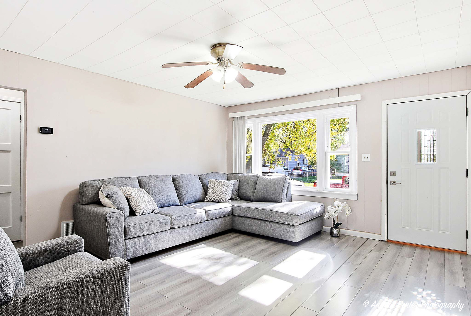 1612 Whitney Street Waukegan, IL 60087 - Photo 6 of 20 a living room with furniture and a large window