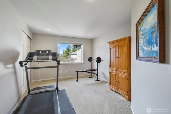 a view of a livingroom with furniture and windows