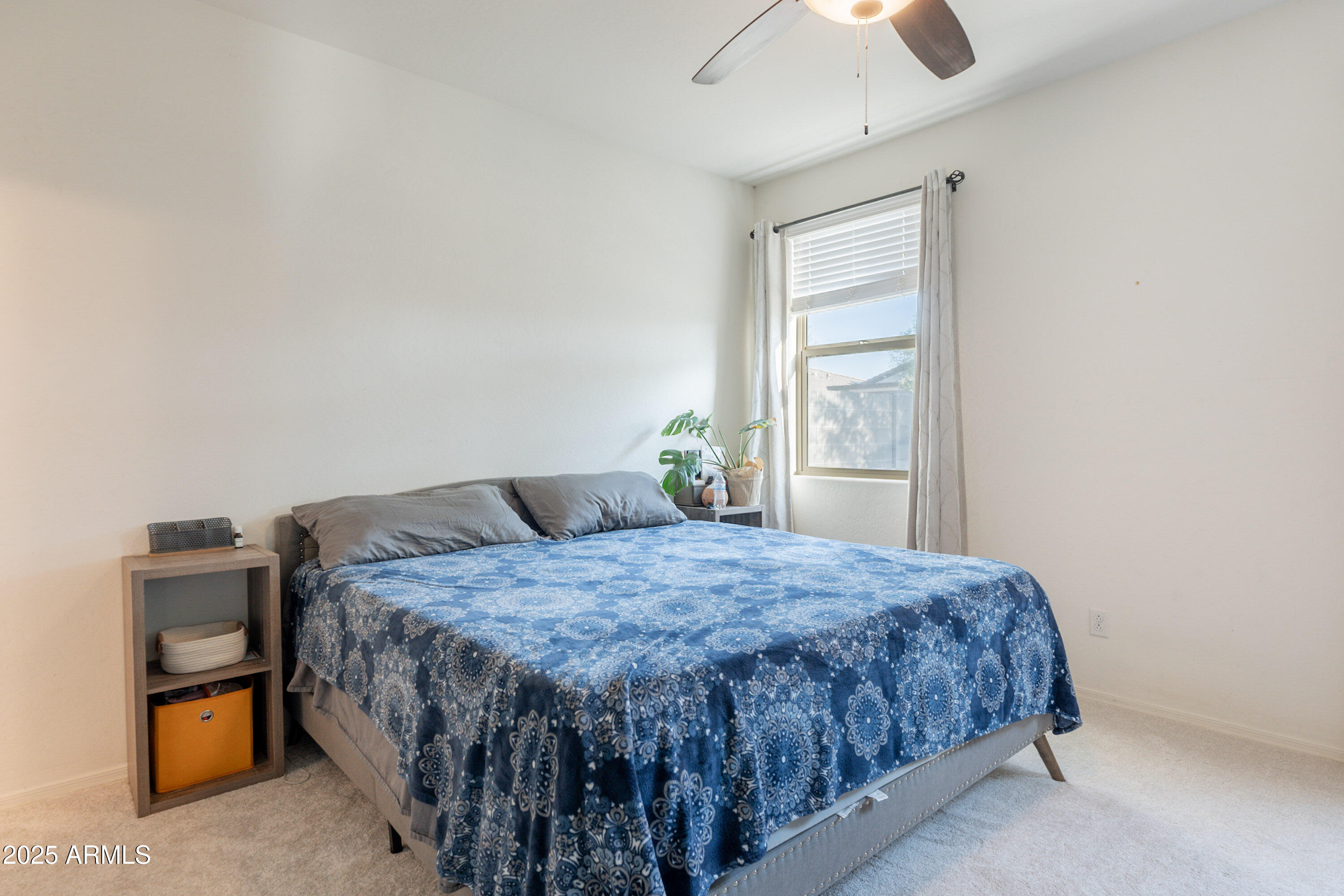 1813 Grenadine Road Phoenix, AZ 85040 - Photo 16 of 33 a bedroom with a bed and a window