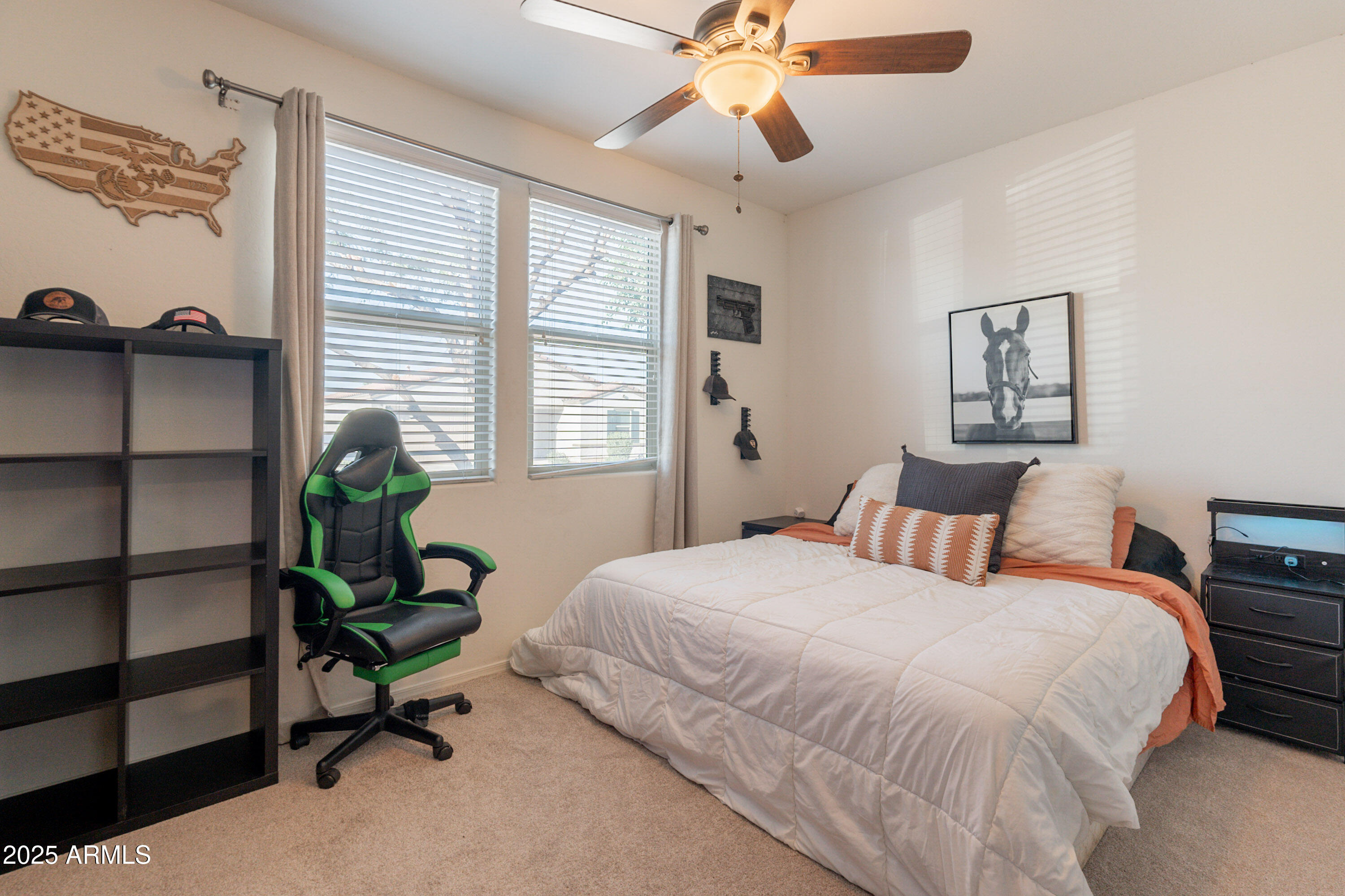 1813 Grenadine Road Phoenix, AZ 85040 - Photo 23 of 33 a bedroom with a bed and a chandelier