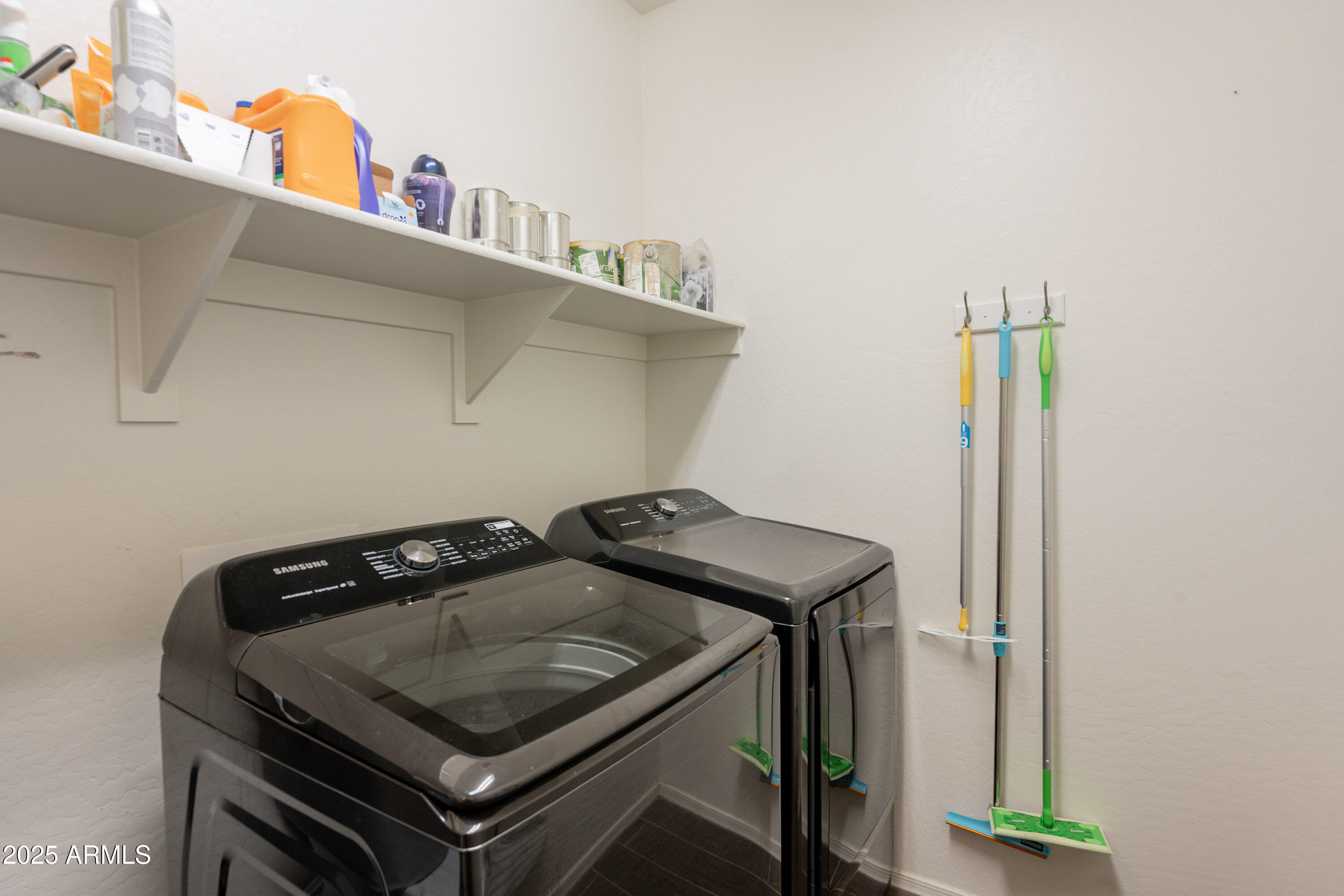 1813 Grenadine Road Phoenix, AZ 85040 - Photo 28 of 33 a utility room with dryer and washer