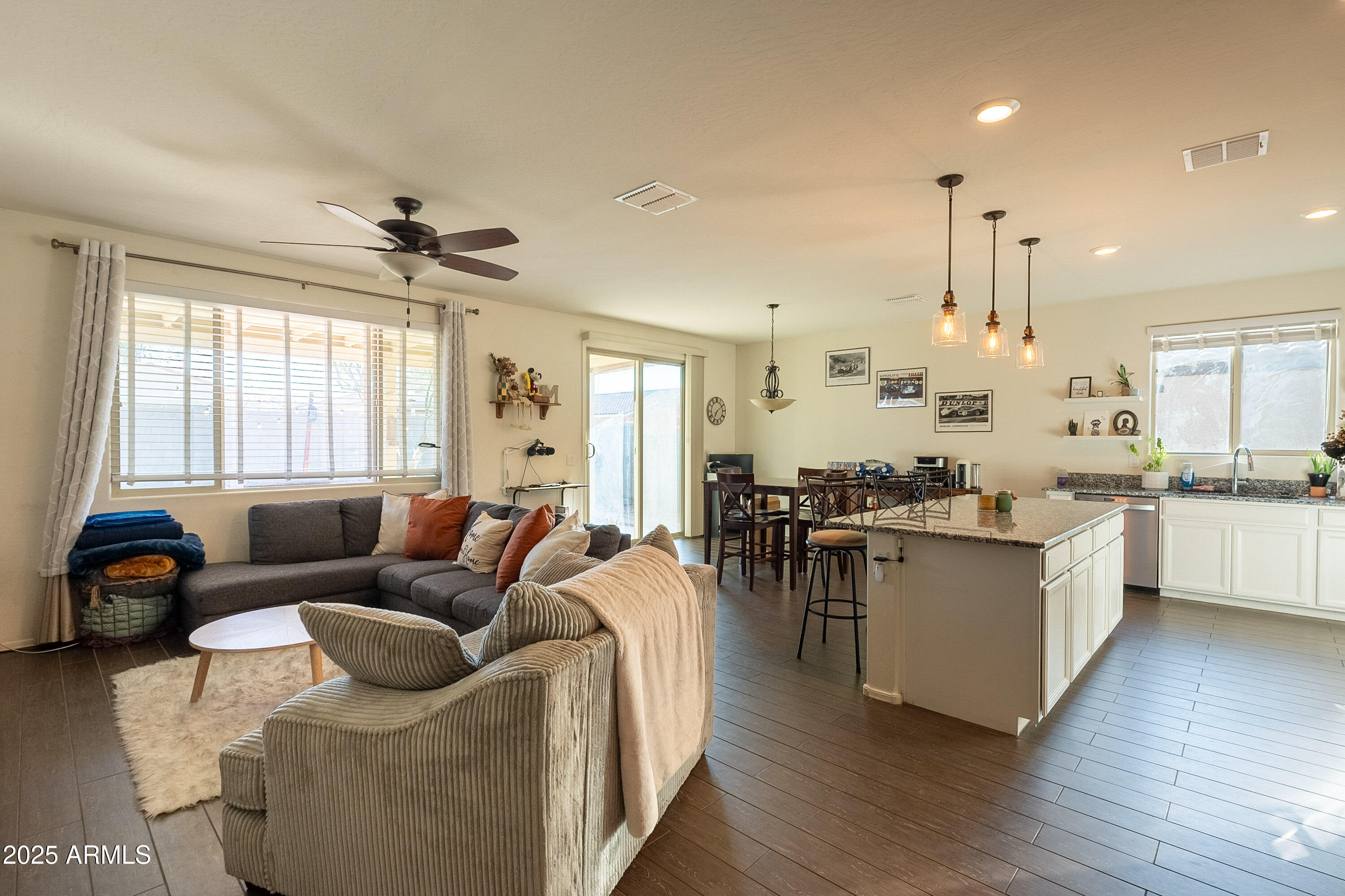 1813 Grenadine Road Phoenix, AZ 85040 - Photo 6 of 33 a living room with furniture and a large window