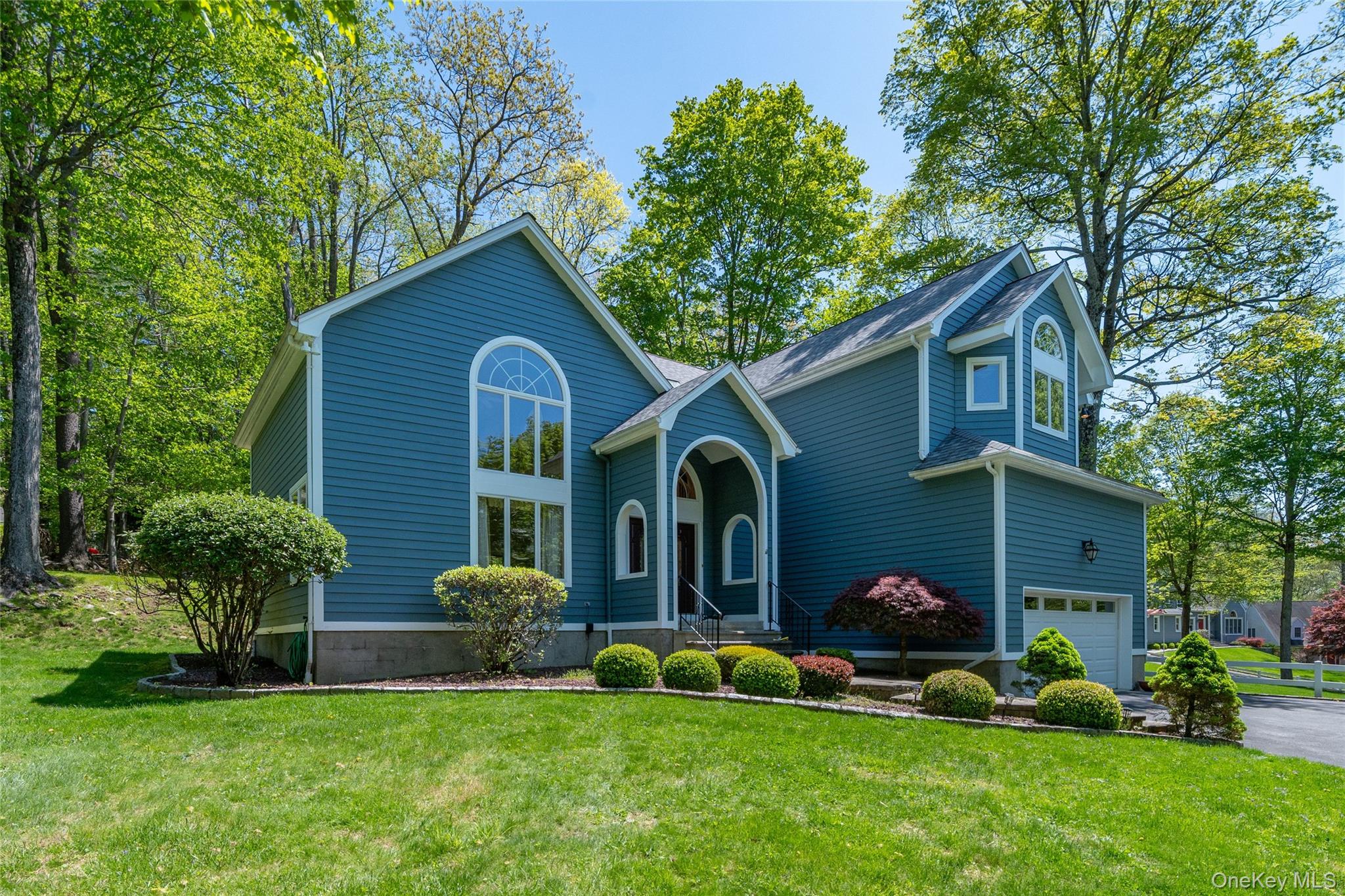 1 Ridge Court Carmel, NY 10512 - Photo 1 of 24 Contemporary-Colonial beautifully set on a quiet cul-de-sac in a highly convenient Carmel location close to town, shopping, dining and everyday amenities.
