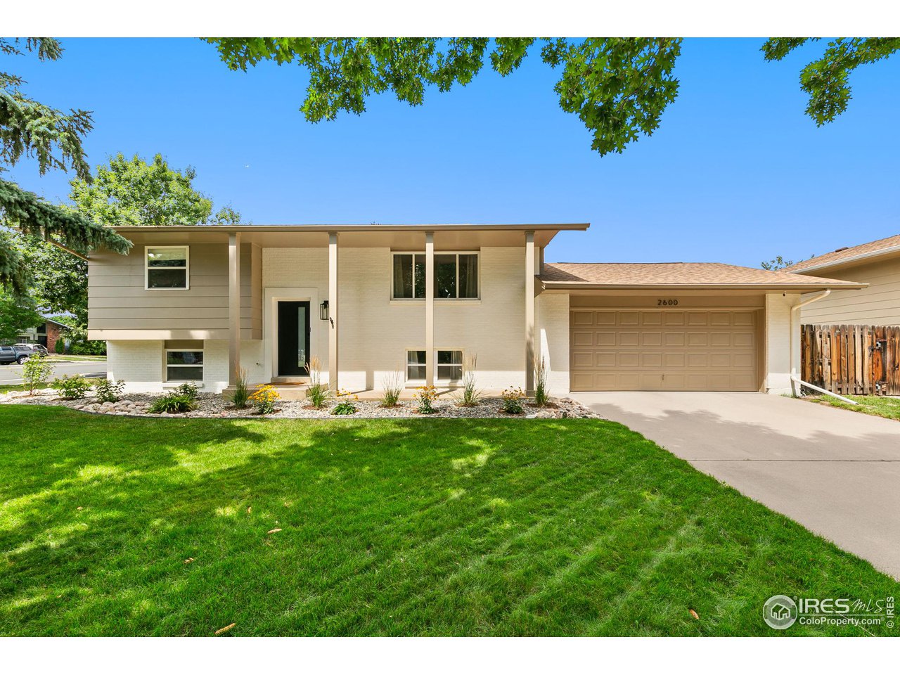 2600 Avocet Road Fort Collins, CO 80526 - Photo 1 of 26 New exterior landscaping, new exterior paint, new front door with keyless entry and full sprinkler system