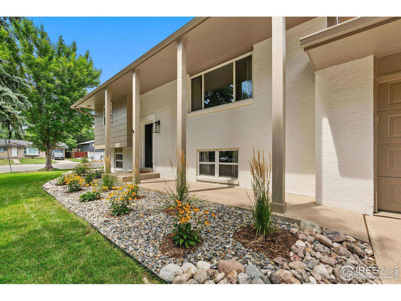 2600 Avocet Road Fort Collins, CO 80526 - Photo 2 of 26 New exterior landscaping, new exterior paint, new front door with keyless entry and full sprinkler system