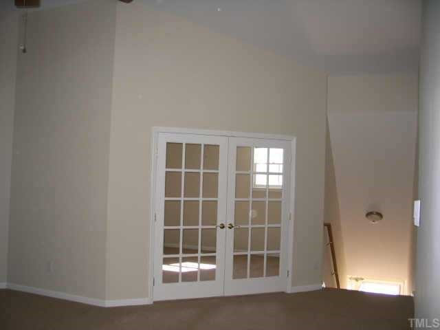 8311 Hempshire Place Raleigh, NC 27613 - Photo 4 of 7 A great den/study/guestroom is off the livingroom seperated by glass french doors. Other