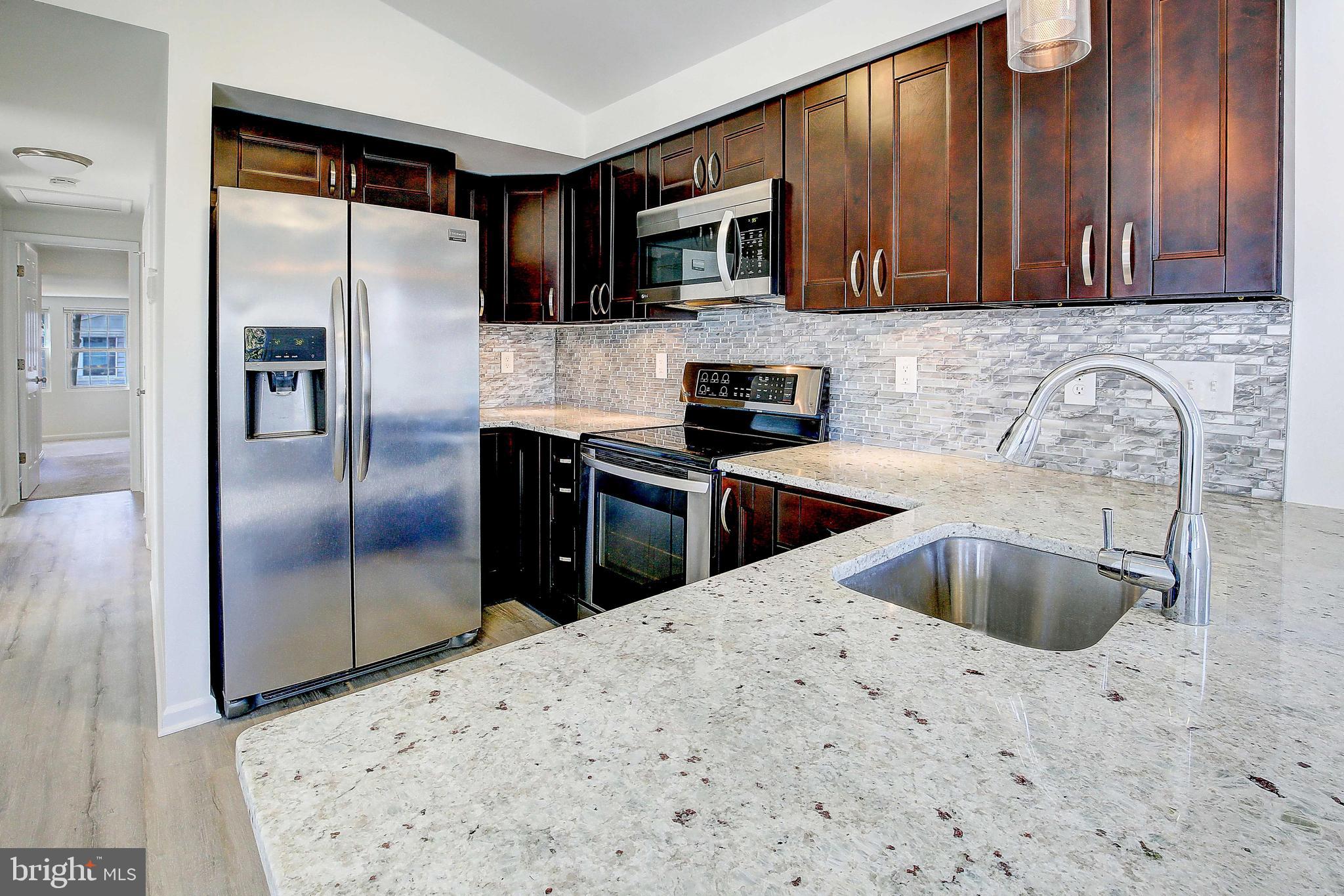 1511 Lincoln Road Shady Side, MD 20764 - Photo 32 of 42 Neutral colored granite