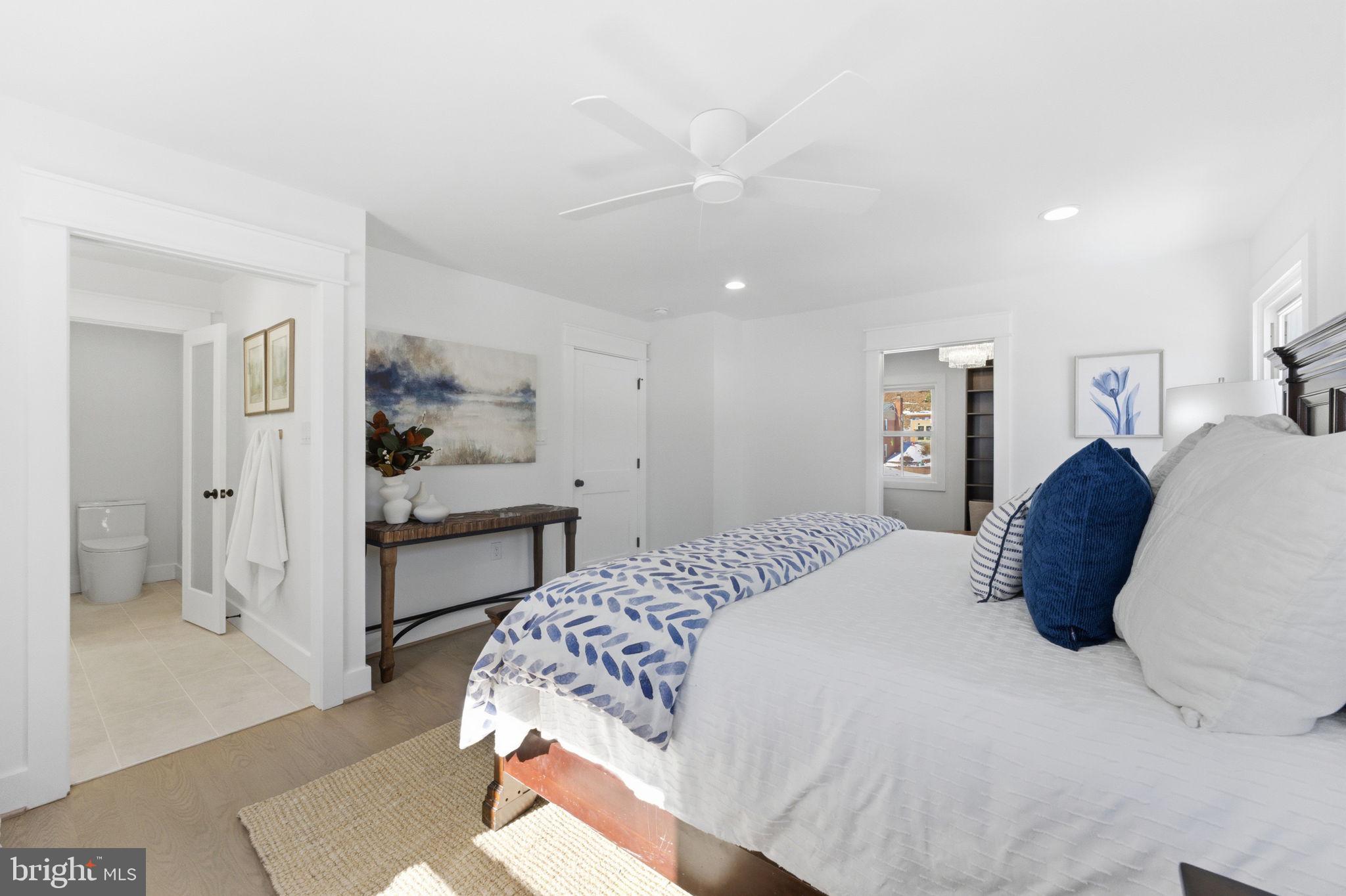 8615 Kerry Lane Springfield, VA 22152 - Photo 14 of 50 a spacious bedroom with a bed and closet