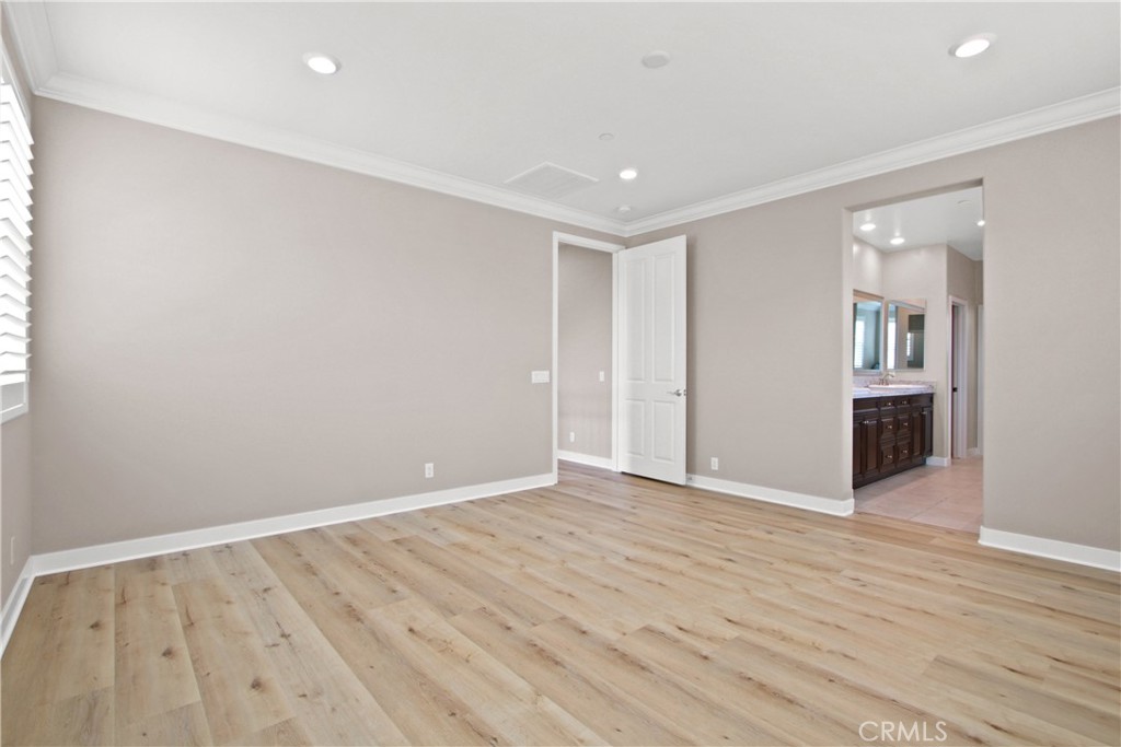 270 Radial Irvine, CA 92618 - Photo 23 of 36 wooden floor in an empty room with a window