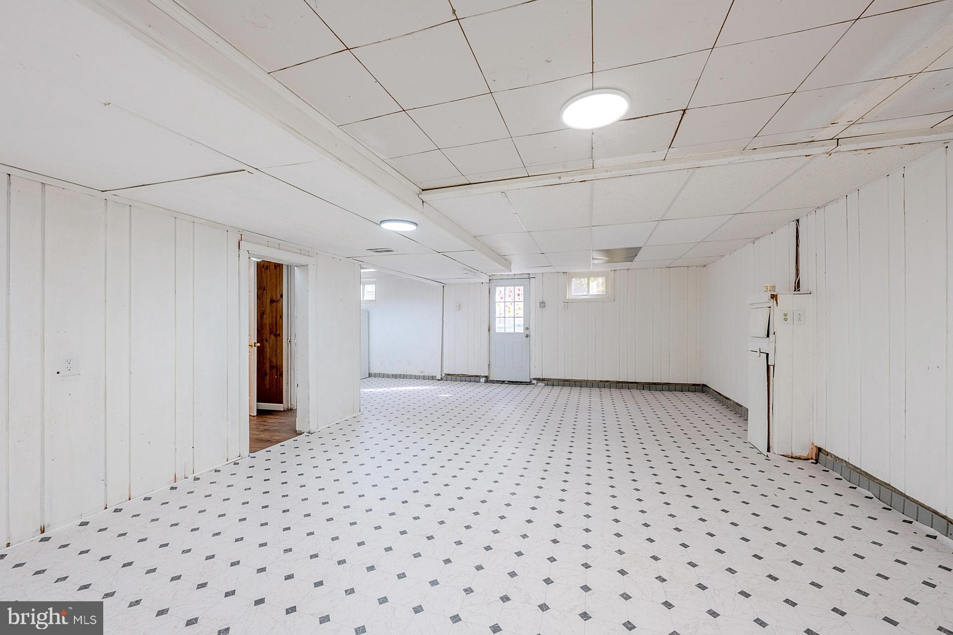1108 Chickasaw Drive Silver Spring, MD 20903 - Photo 22 of 30 a view of a livingroom with a chandelier