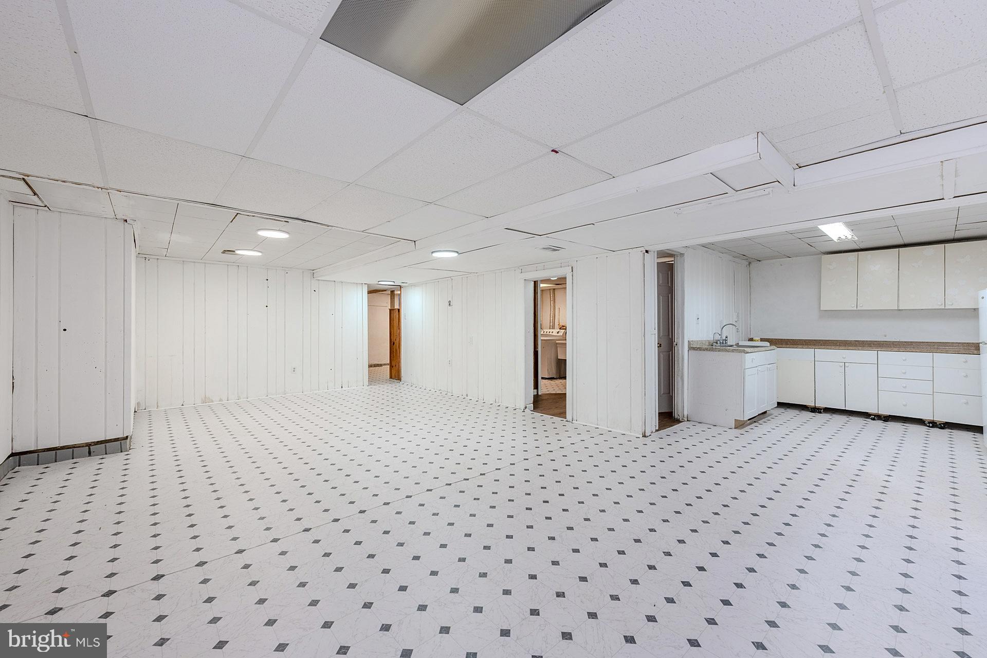 1108 Chickasaw Drive Silver Spring, MD 20903 - Photo 23 of 30 a view of a big room with a fireplace