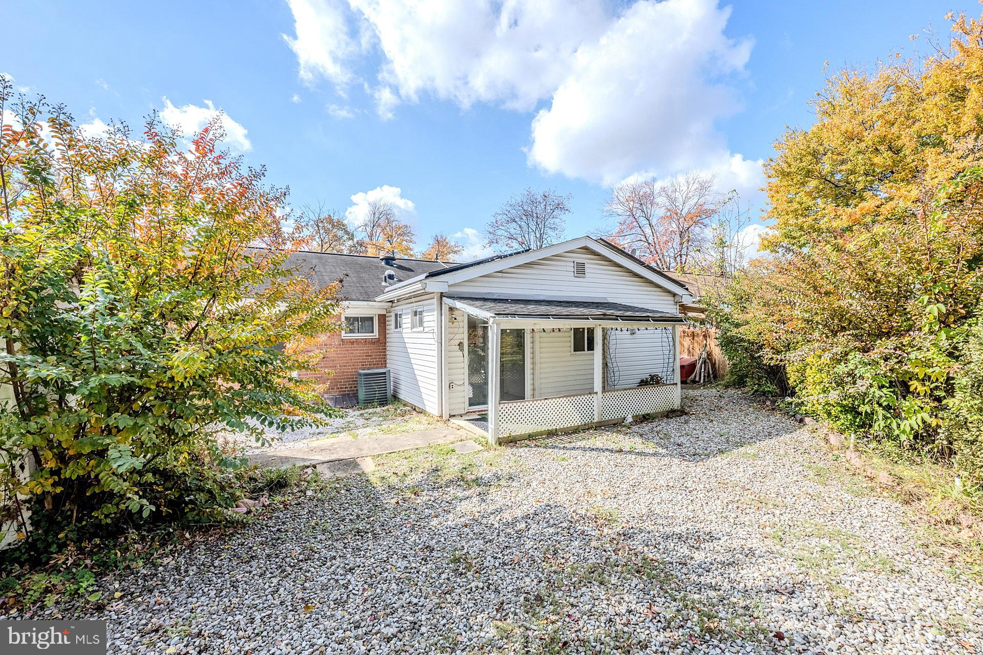 1108 Chickasaw Drive Silver Spring, MD 20903 - Photo 29 of 30 a white house that has a tree in front of it
