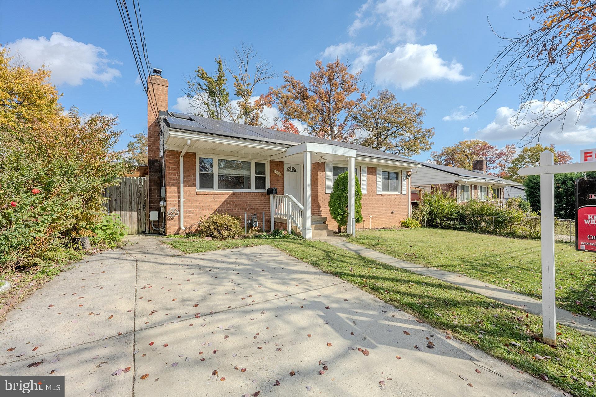 1108 Chickasaw Drive Silver Spring, MD 20903 - Photo 4 of 30 a front view of a house with a porch