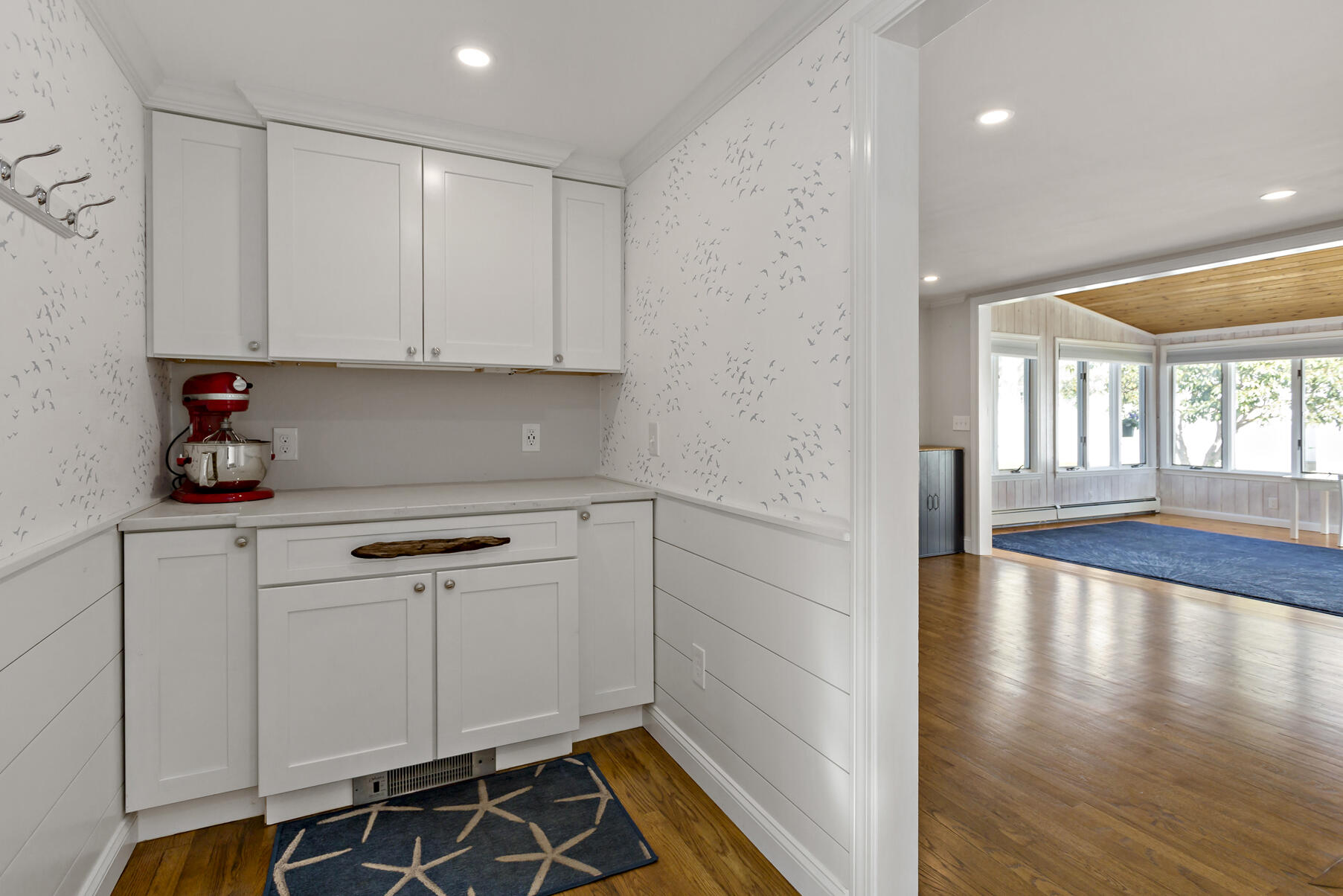 50 Deerfield Road Osterville, MA 02655 - Photo 16 of 32 a kitchen with a sink and cabinets