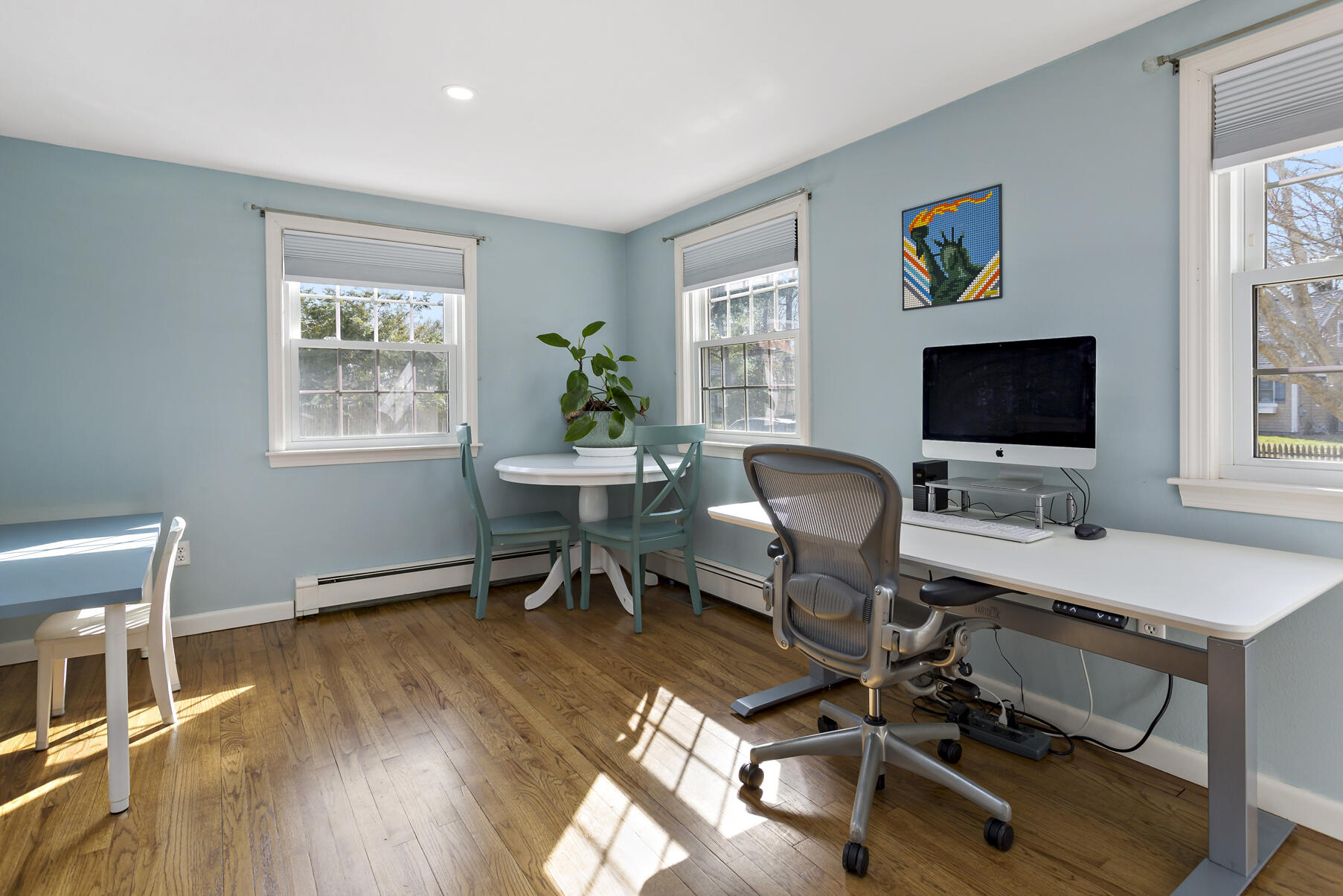 50 Deerfield Road Osterville, MA 02655 - Photo 18 of 32 a workspace with wooden floor and a window