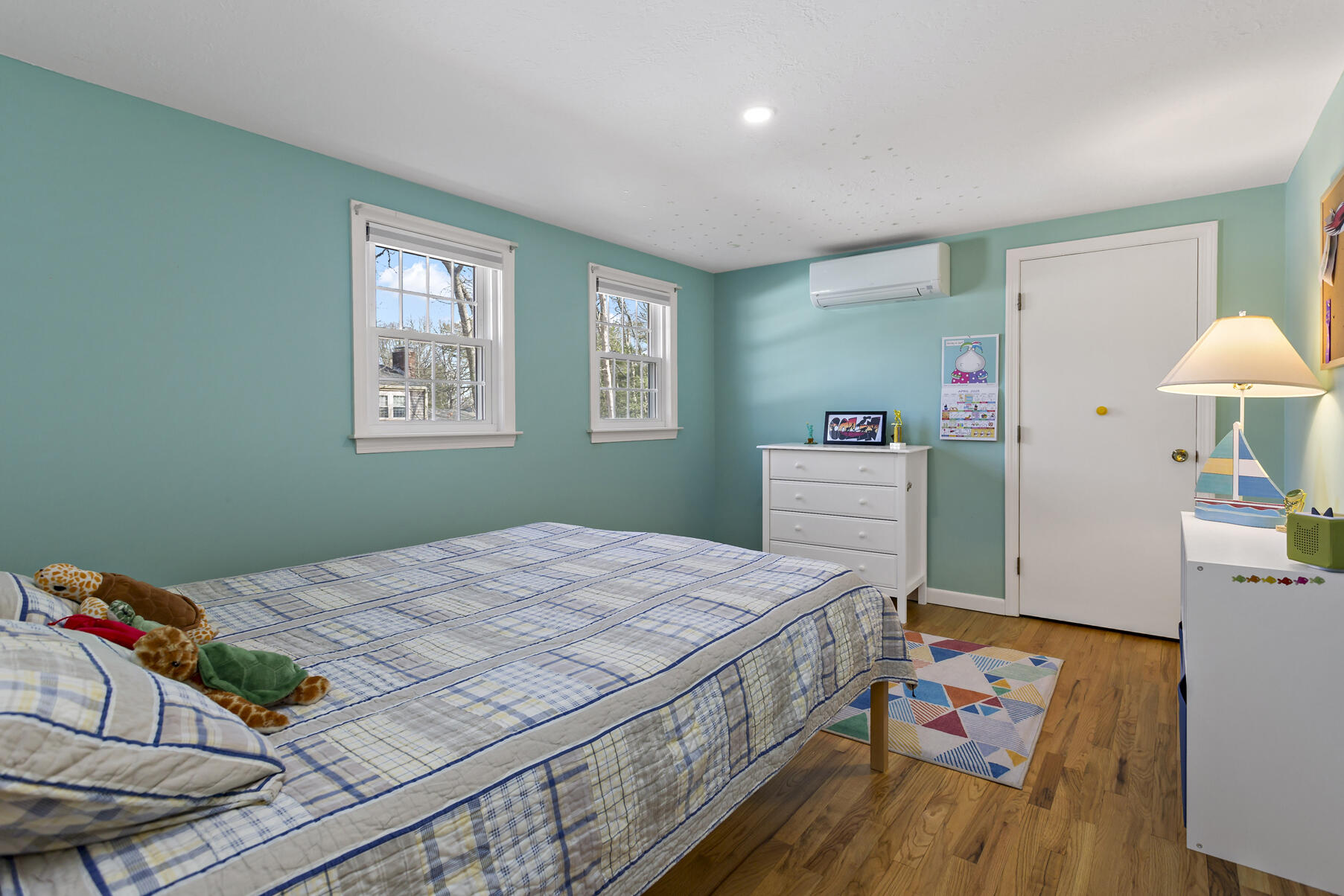 50 Deerfield Road Osterville, MA 02655 - Photo 21 of 32 a bedroom with a bed and a dresser in it