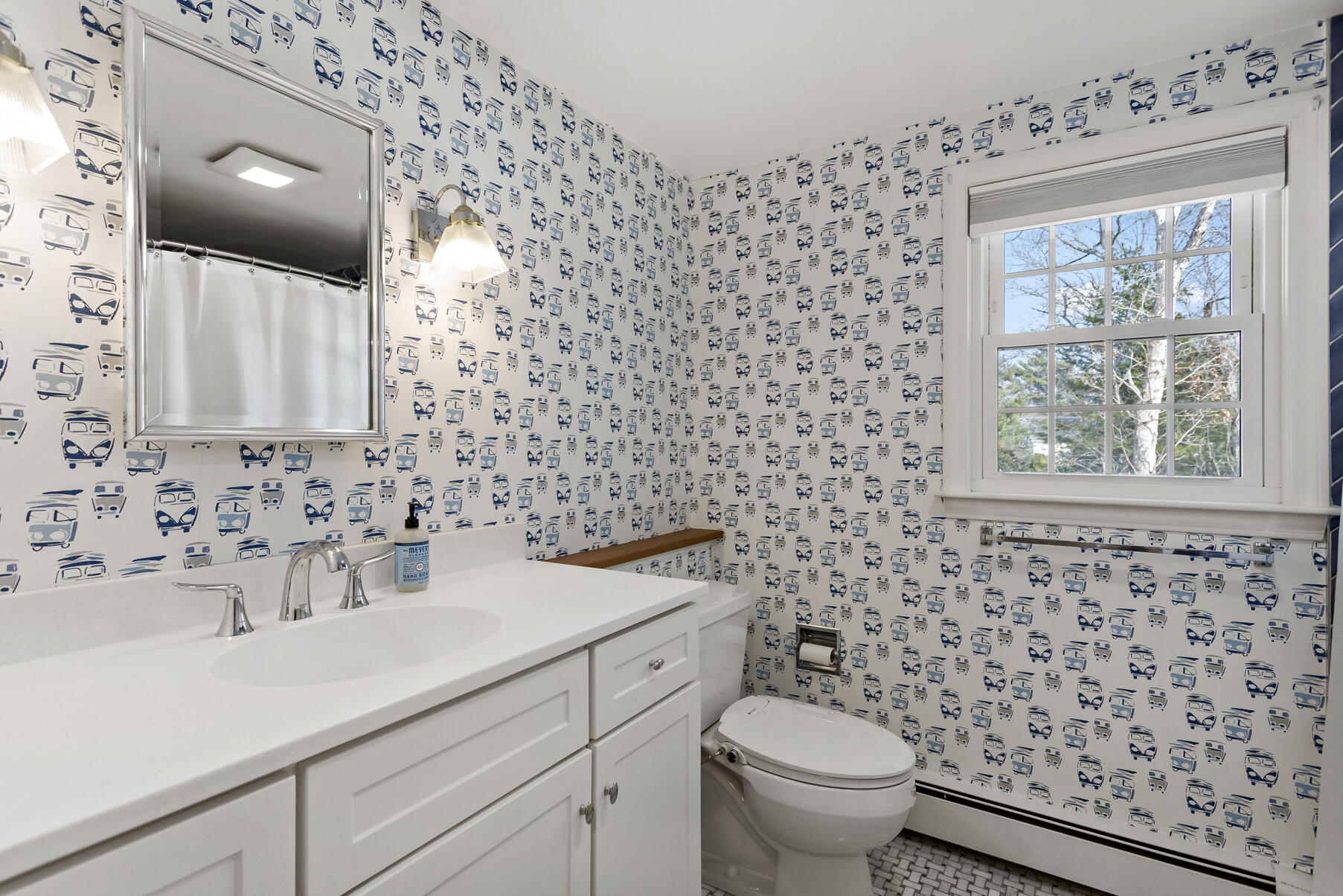 50 Deerfield Road Osterville, MA 02655 - Photo 23 of 32 a bathroom with a sink toilet and mirror
