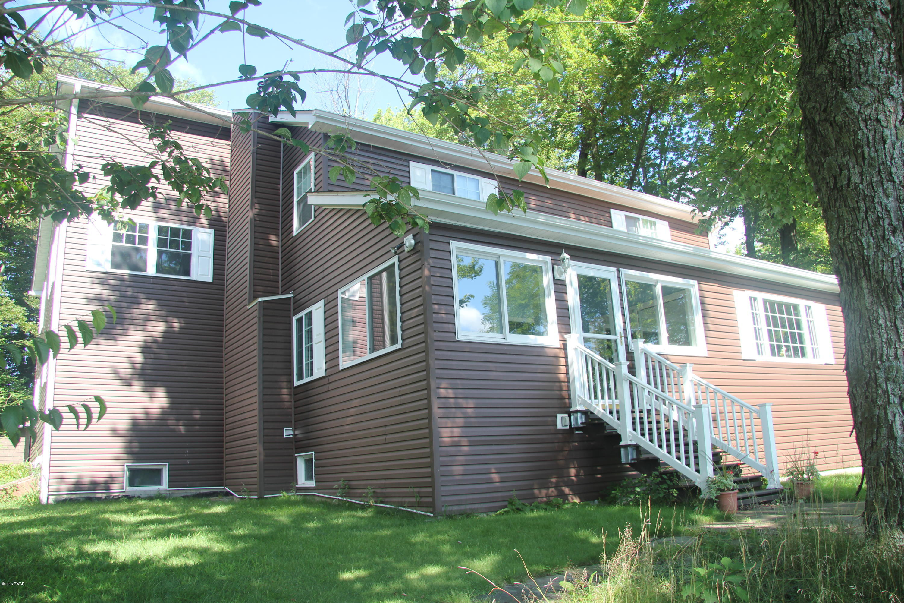 38 Coxton Lake Road Thompson, PA 18465 - Photo 5 of 22 Back of Home