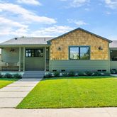 a view of front a house with a yard