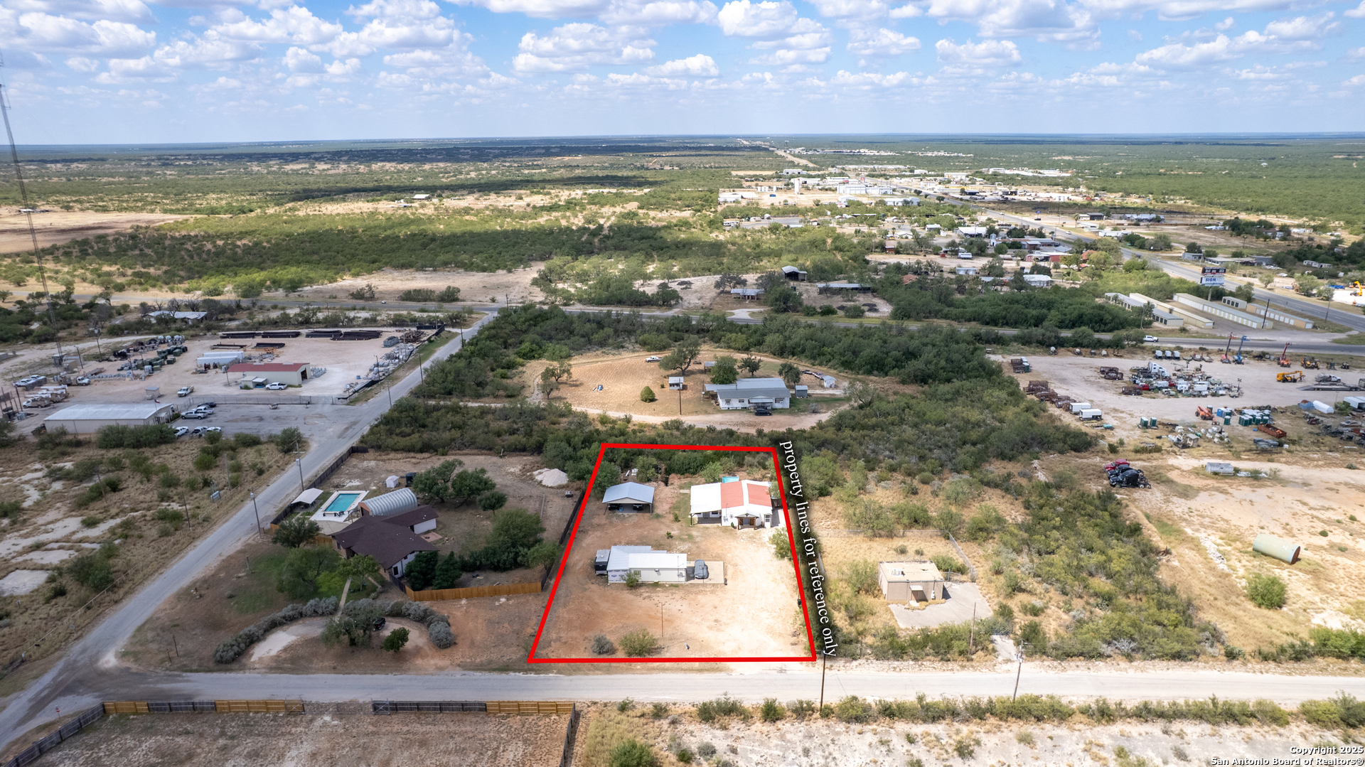152 John Ayers Road Carrizo Springs, TX 78834 - Photo 12 of 14 a view of a city with ocean view