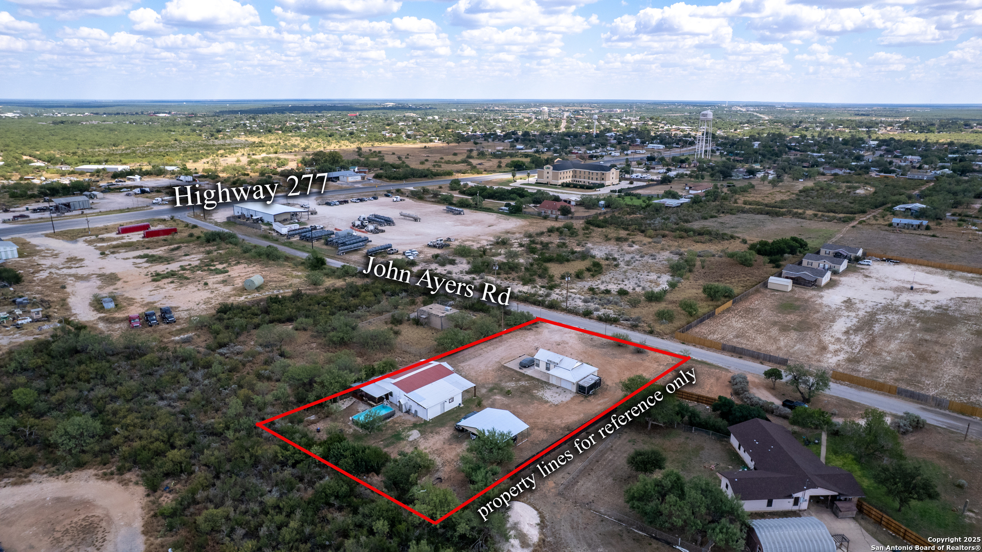 152 John Ayers Road Carrizo Springs, TX 78834 - Photo 13 of 14 an aerial view of a city