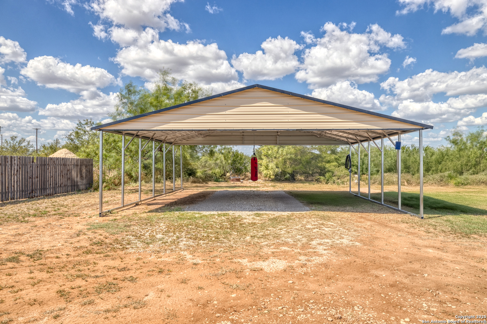 152 John Ayers Road Carrizo Springs, TX 78834 - Photo 4 of 14 a view of a backyard