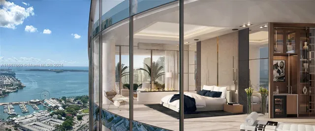 a very nice looking room with a large window and furniture