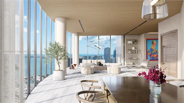 a bedroom with furniture and a potted plant