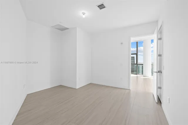 a view of a city with tall buildings