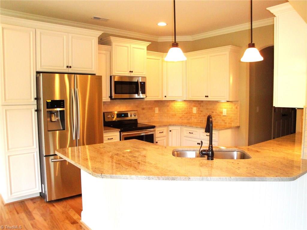 2230 Renaissance Lane High Point, NC 27262 - Photo 8 of 25 The seller upgraded to Samsung appliances, including the new refrigerator, which will remain.