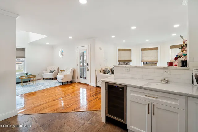 a kitchen with stainless steel appliances granite countertop a sink and cabinets