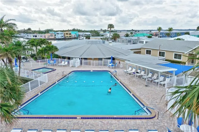 a view of a city with lawn chairs