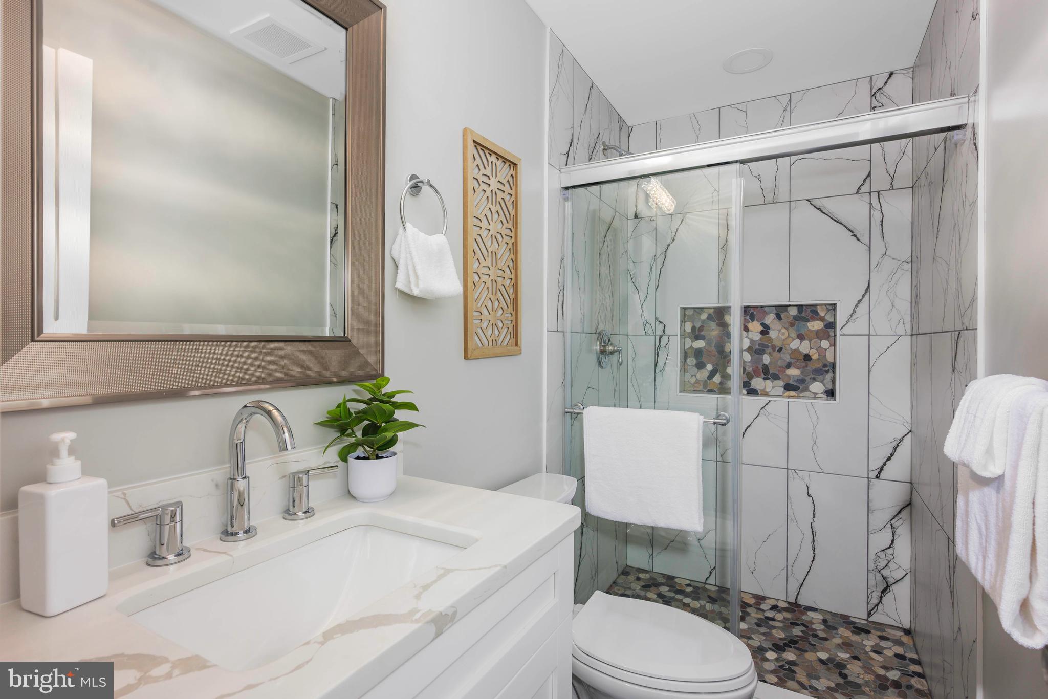 7858 Tick Neck Road Pasadena, MD 21122 - Photo 25 of 43 Newly renovated bathroom -lower level