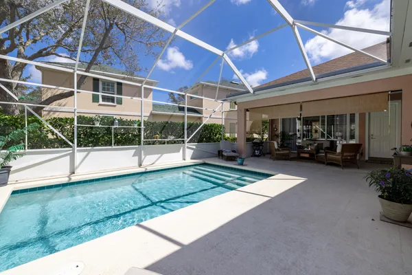 a view of a backyard with porch area