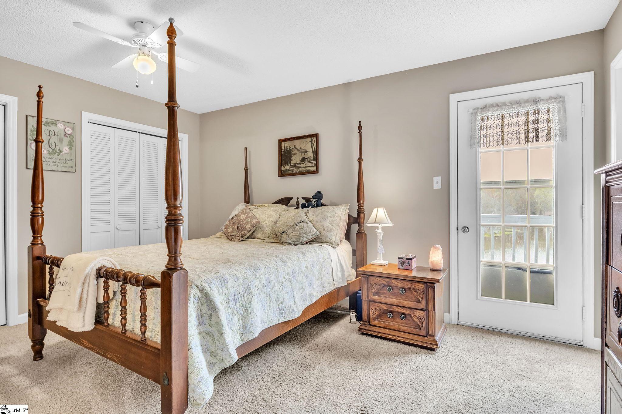 143 Chestnut Lake Drive Inman, SC 29349 - Photo 12 of 27 Master on Main with its own balcony over looking the lake!