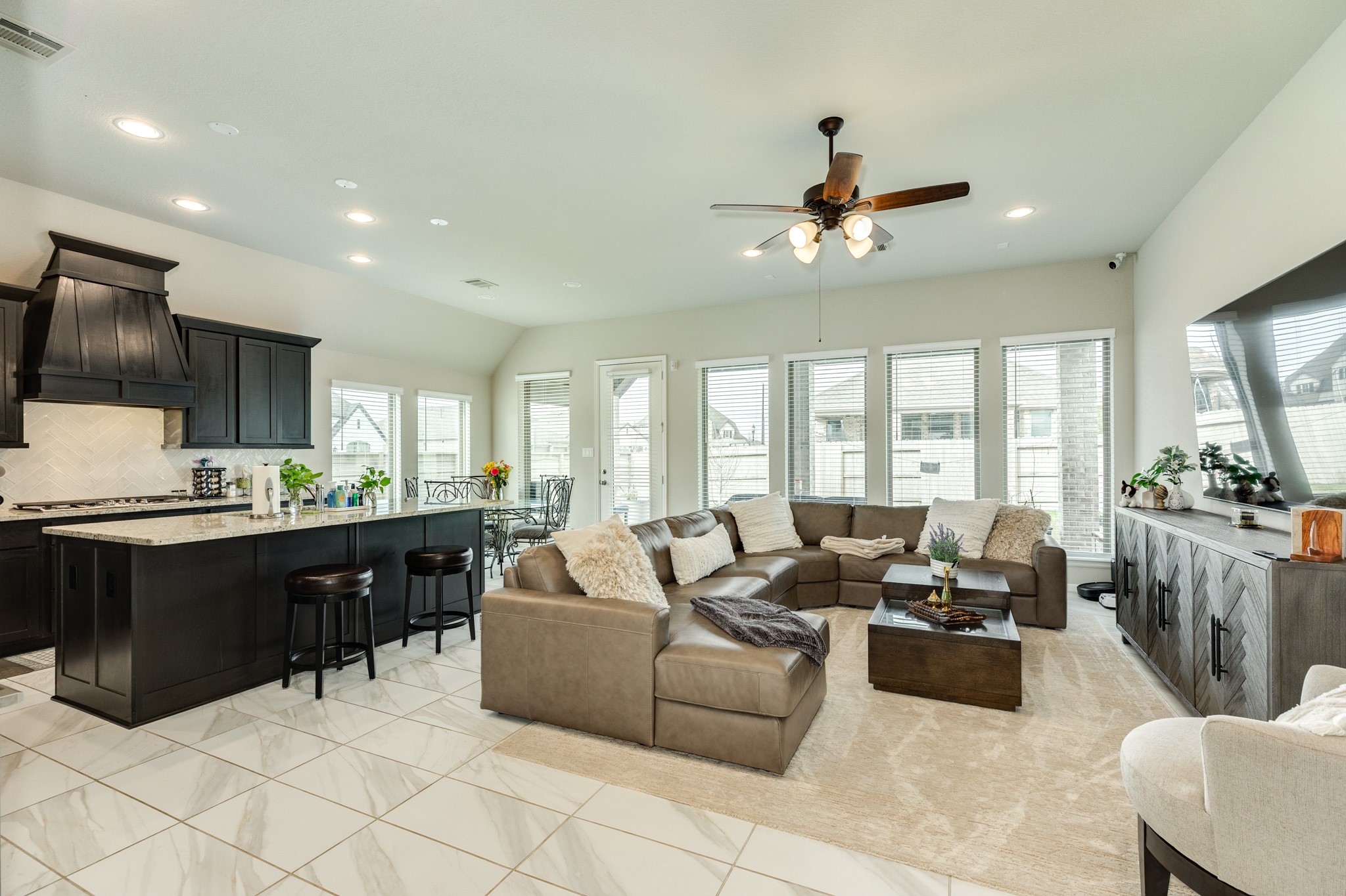 5138 Walnut Grv Lane Manvel, TX 77578 - Photo 9 of 43 a living room with furniture kitchen view and a large window