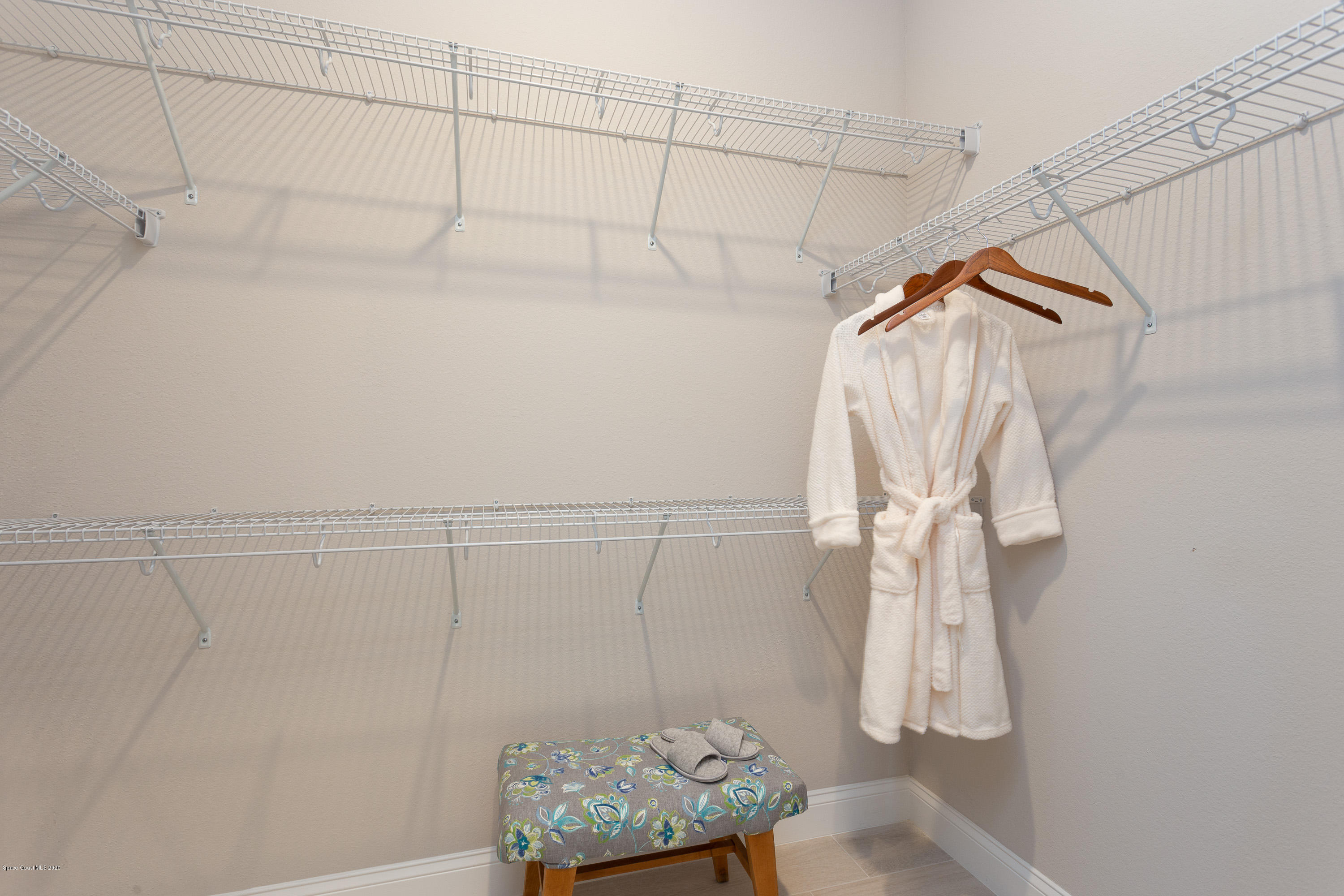 4435 Negal Circle Melbourne, FL 32901 - Photo 23 of 33 a bathroom with a shower and curtain