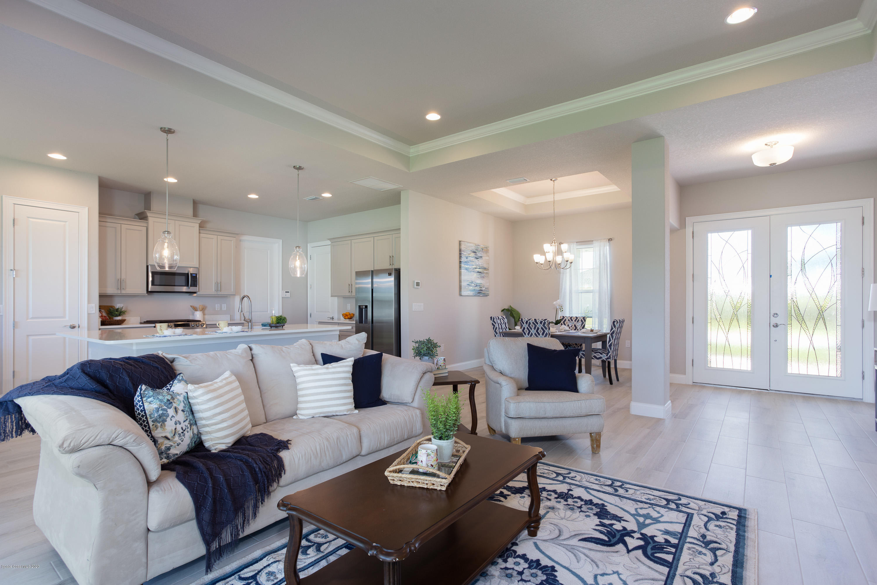 4435 Negal Circle Melbourne, FL 32901 - Photo 7 of 33 a living room with furniture and wooden floor