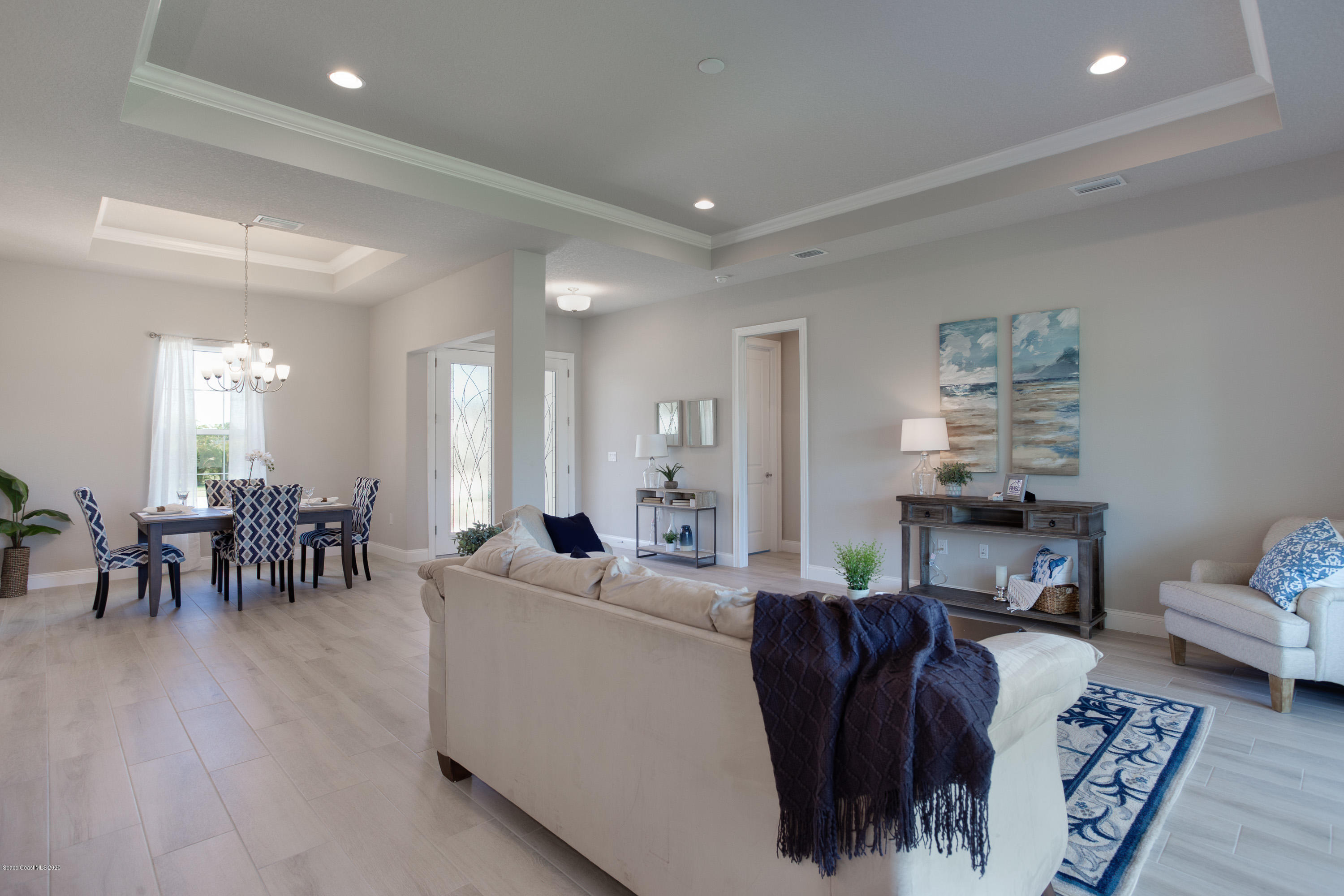 4435 Negal Circle Melbourne, FL 32901 - Photo 10 of 33 a living room with furniture and a dining table