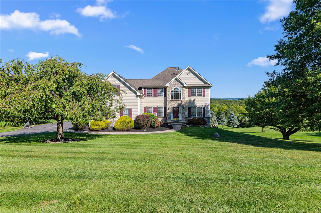 2617 Rising Sun Road Slatington, PA 18080 - Photo 2 of 58 Mature trees flank a rolling green lawn fronting this stately two-story home.