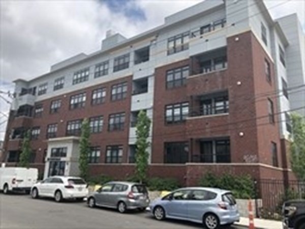 20 Penniman Road, Unit 108 Boston, MA 02134 - Photo 12 of 14 a car parked in front of a building