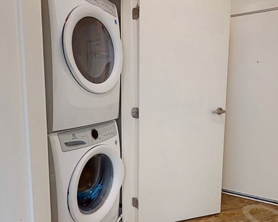 20 Penniman Road, Unit 108 Boston, MA 02134 - Photo 9 of 14 a utility room with dryer and washer
