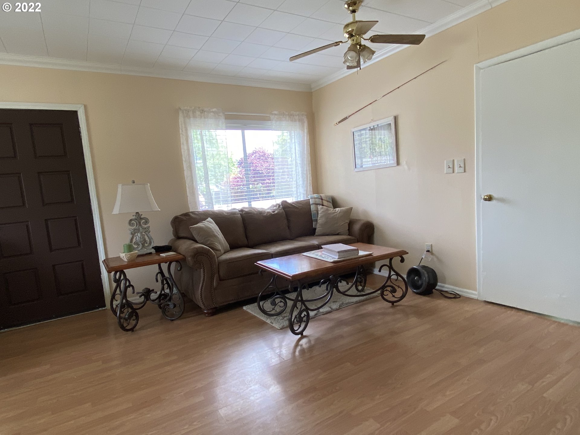 296 Applegate Street Yoncalla, OR 97499 - Photo 7 of 18 a living room with furniture a window and a wooden floor