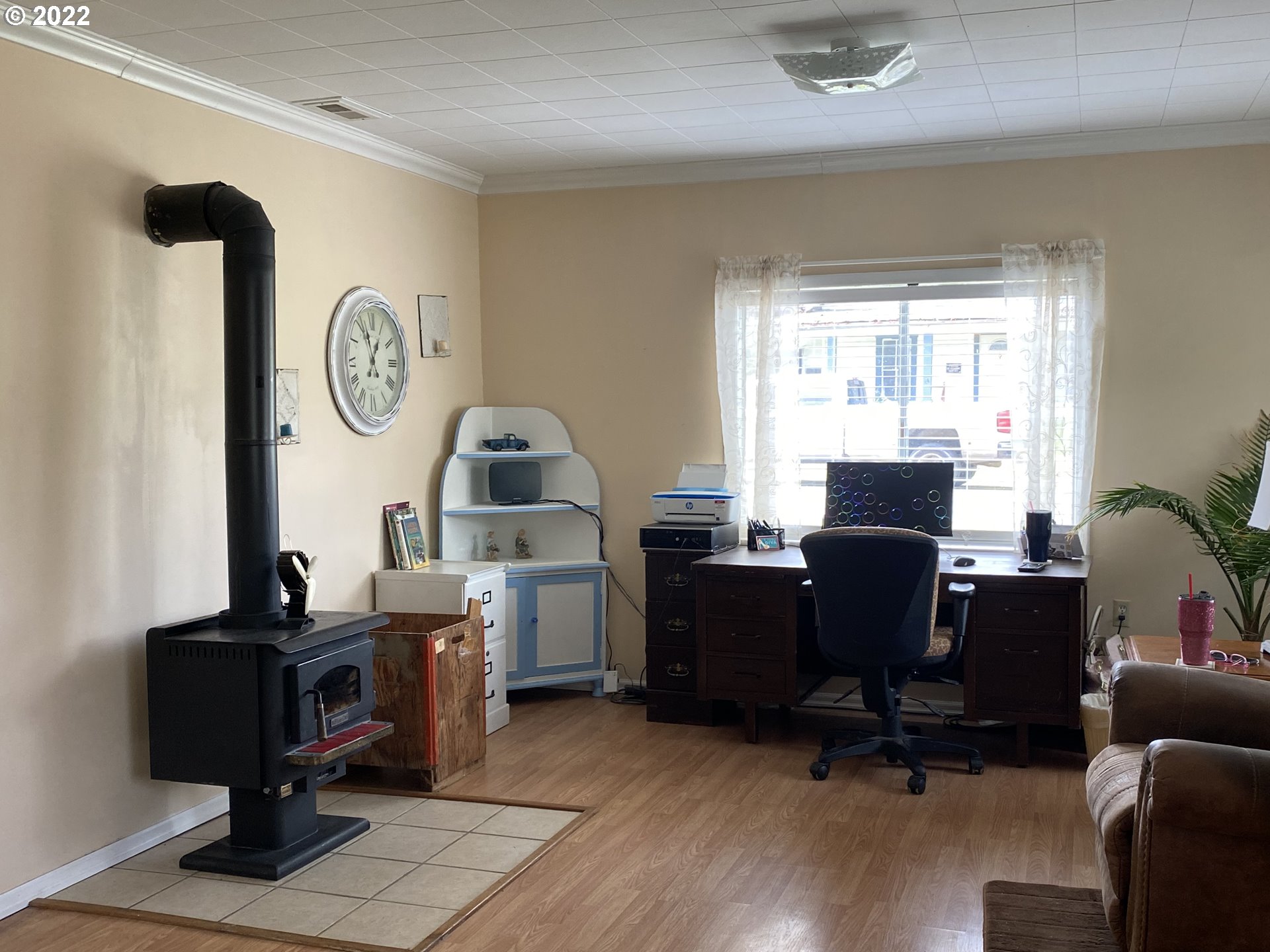 296 Applegate Street Yoncalla, OR 97499 - Photo 10 of 18 a view of a workspace with furniture and a window
