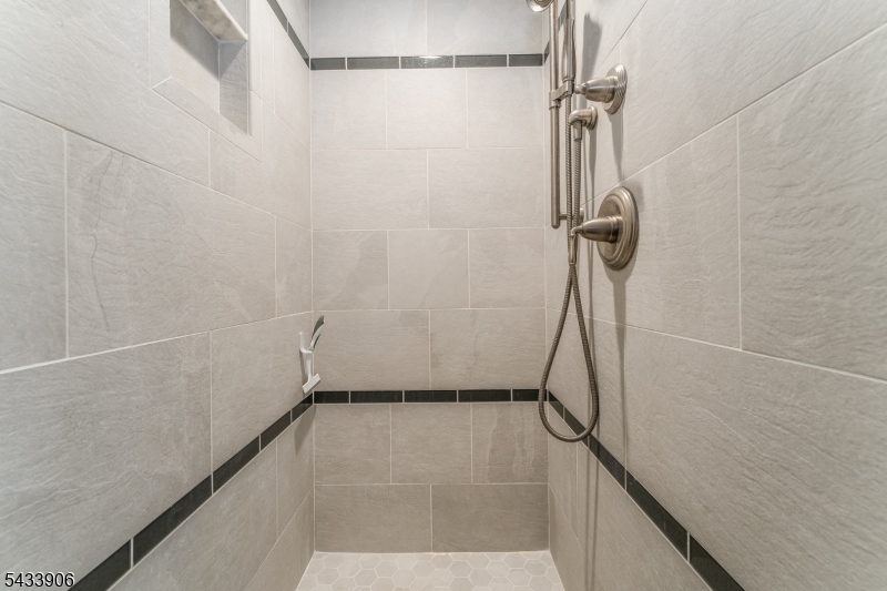 14 Lexington Road Annandale, NJ 08801 - Photo 34 of 47 a bathroom with a shower